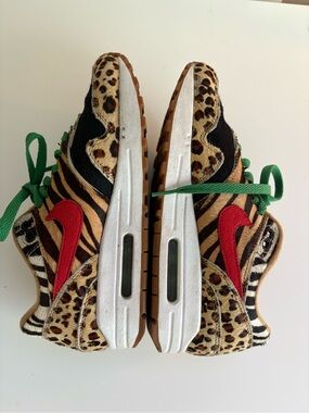 Nike Animal Print Sneakers with Red Swoosh and Green Laces